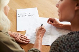 Wills and estate Campbelltown lawyer helping a senior woman
